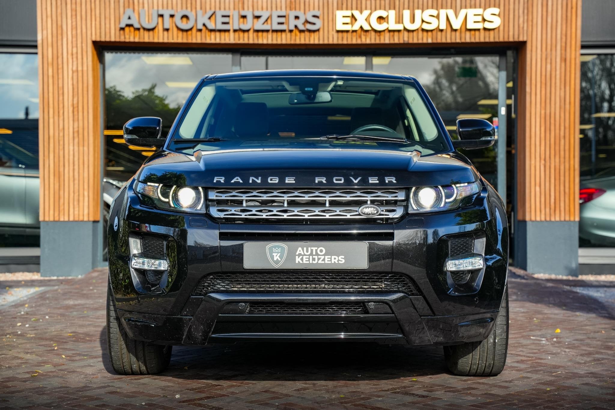Land Rover Range Rover Evoque 2.0 Si 4WD Dynamic Panoramadak, Auto's, Automaat, Gebruikt, 4 cilinders, Zwart