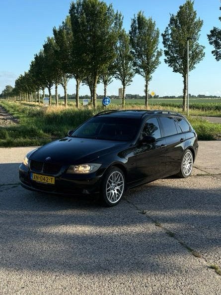 BMW 3-Serie 2.0 I 320 Touring 2007 Zwart 183.347 km, 13 km/l, Achterwielaandrijving, 1995 cc, 4 cilinders