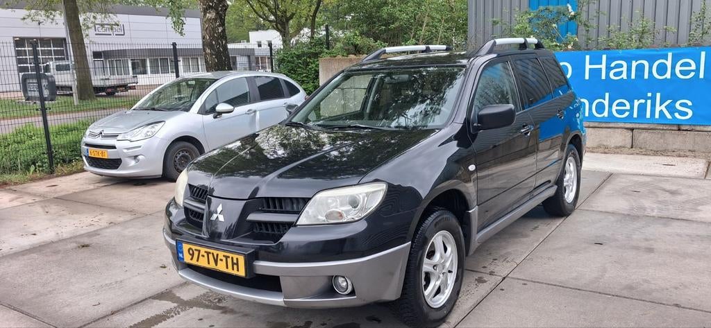 Mitsubishi Outlander 2.0 MPI  LPG G3 2007 Zwart, Auto's, Voorwielaandrijving, Outlander, Zwart, 4 cilinders