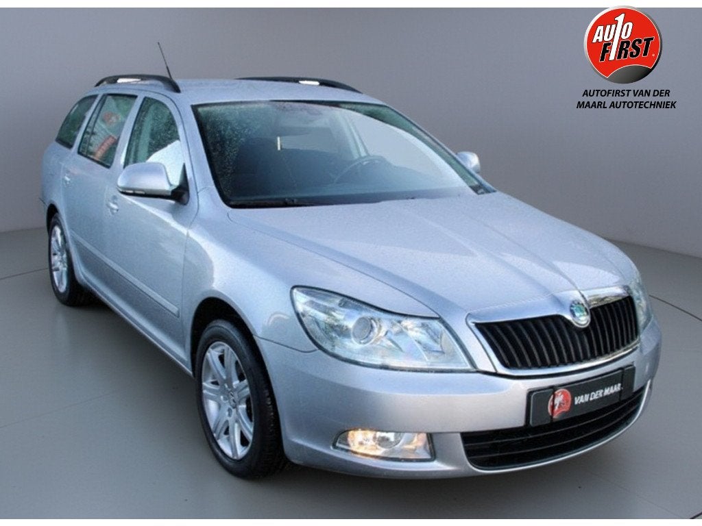 Skoda Octavia Combi 1.4 TSI Ambition Bns (bj 2011), Auto's, Euro 5, Stof, Gebruikt, Zwart