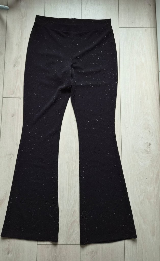 Nieuwe flared glitter legging van Hema, Maat 38/40 (M), Zwart, Nieuw, Ophalen of Verzenden