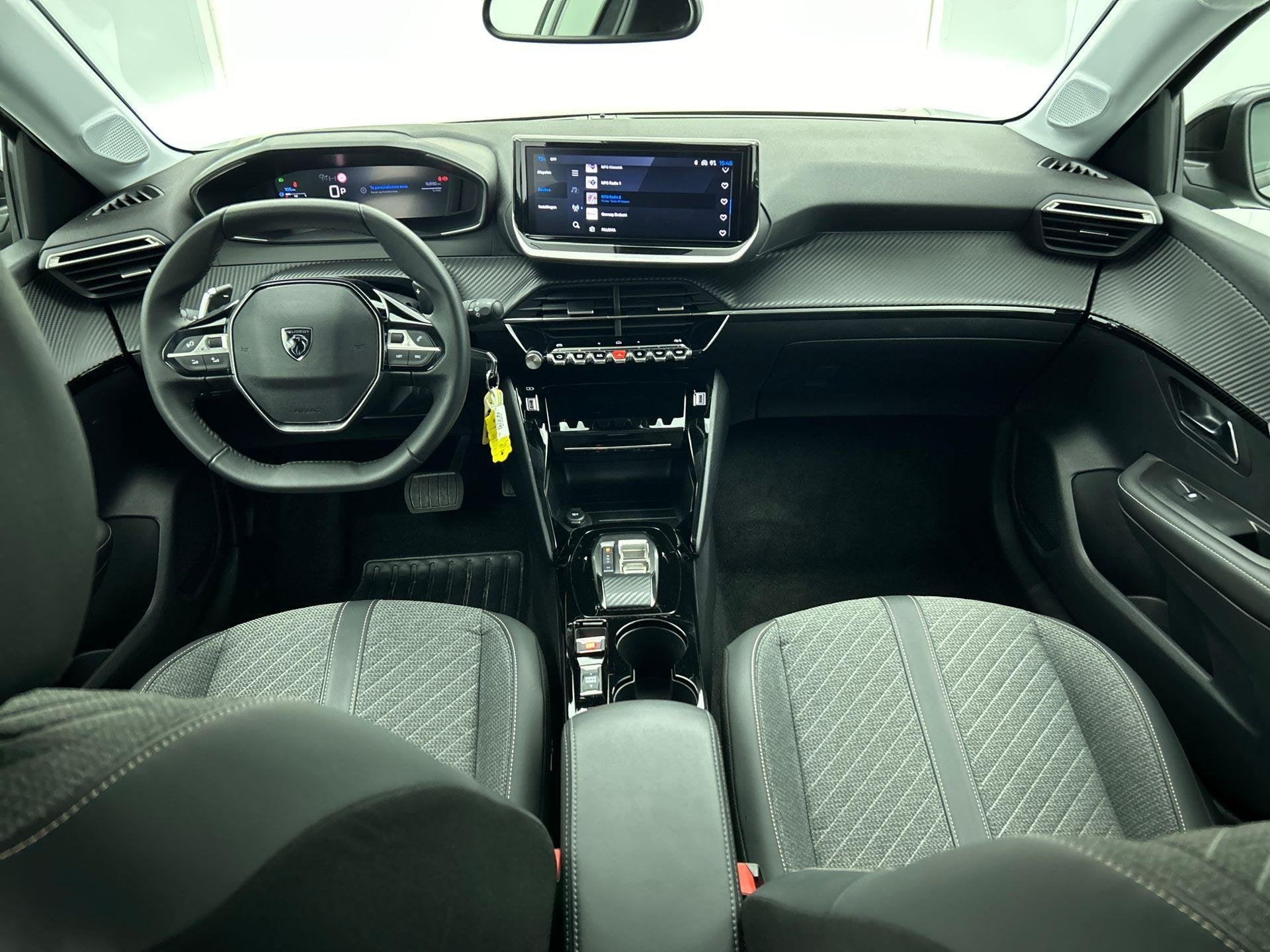 Peugeot 208 1.2 Hybrid 100PK Automaat Allure Navigatie Apple, Auto's, Peugeot, 1195 kg, Gebruikt, 1199 cc, Leder en Stof
