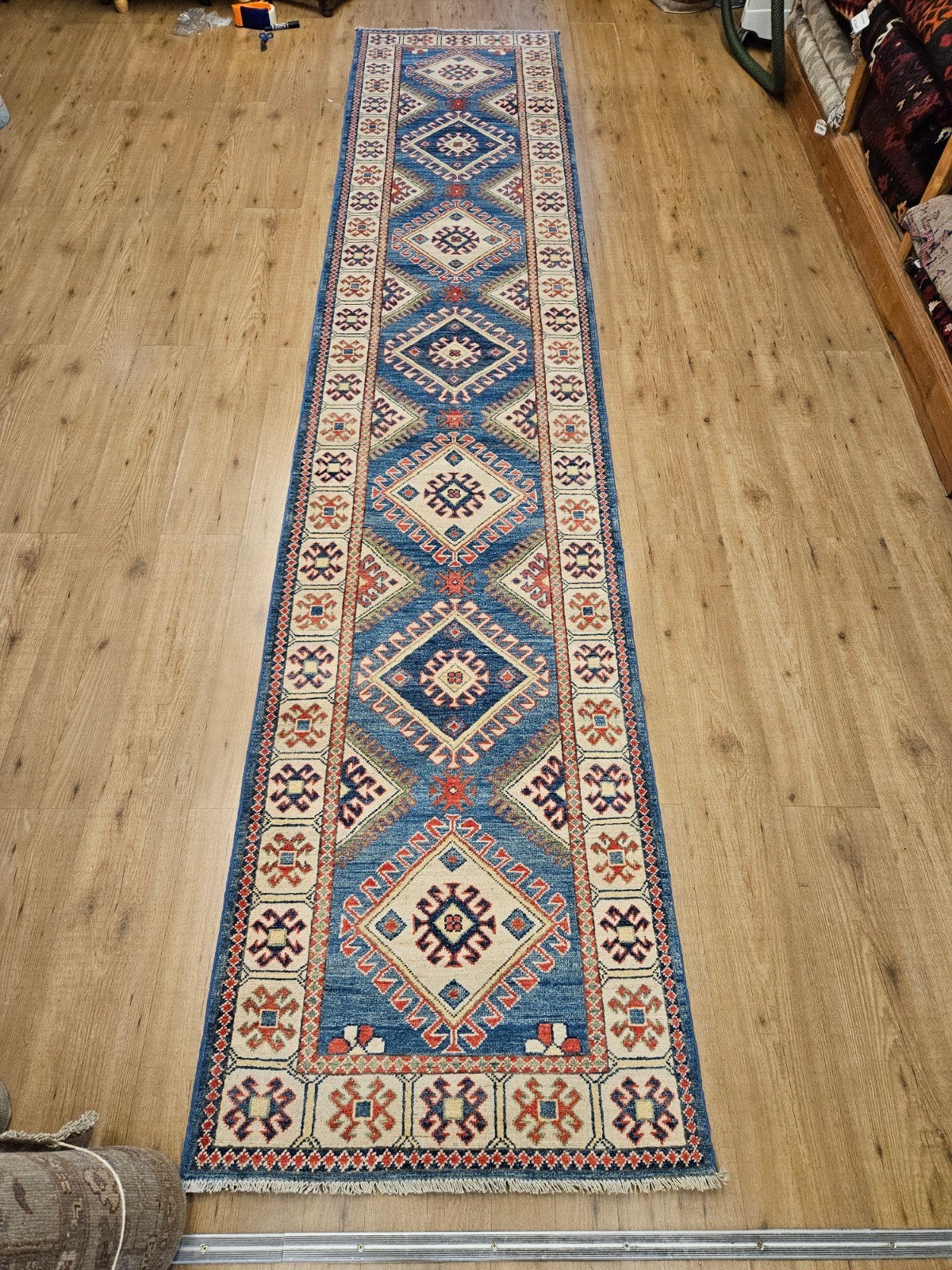 Handgeknoopt oosters tapijt loper kazak 398x83
