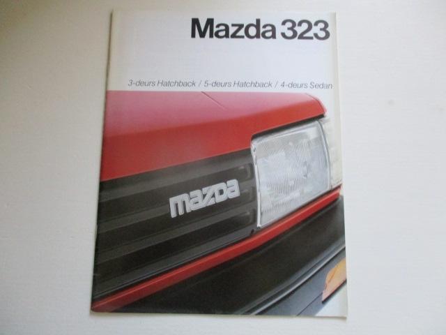 Mazda 323 boekje + prijslijst, Boeken, Ophalen of Verzenden, Gelezen, Mazda