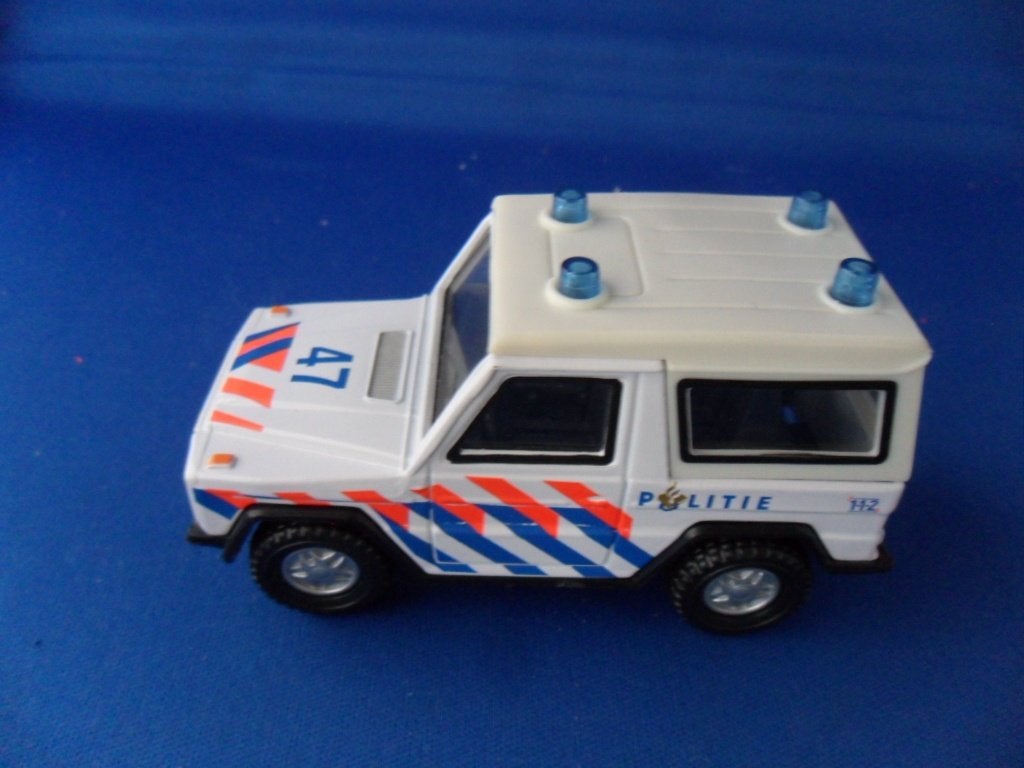 Politie  - Mercedes G-Klasse model Cararama 1:43, Hobby en Vrije tijd, Ophalen of Verzenden, Zo goed als nieuw, Auto, Overige merken