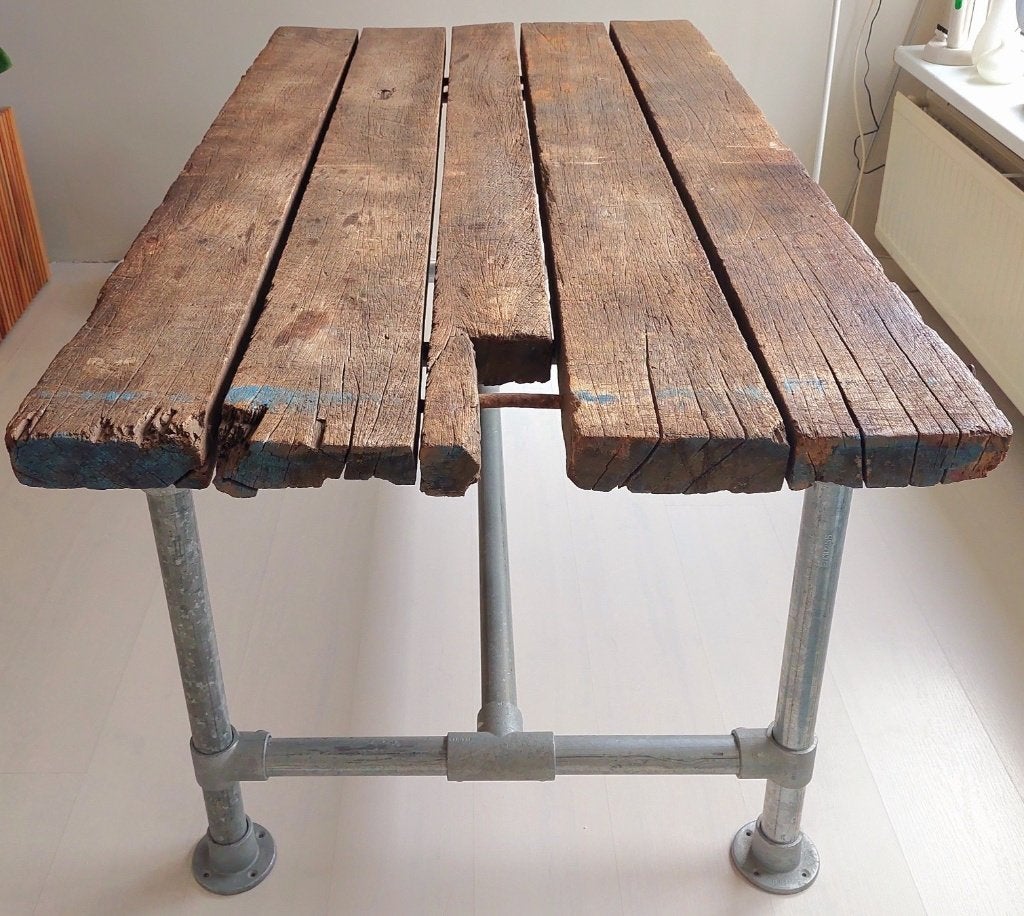 Industriële eettafel met uniek blad van oude rijplaat, Gebruikt, 50 tot 100 cm, Vijf personen of meer, 150 tot 200 cm