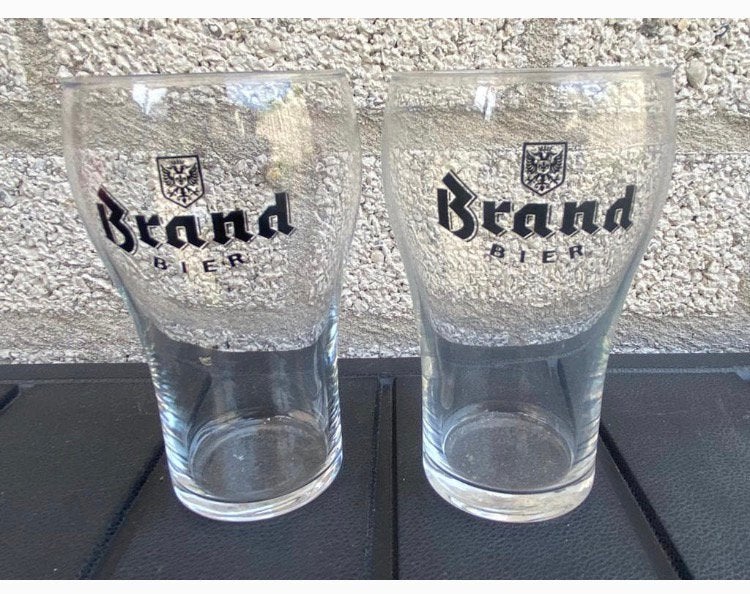 2 Brand bierglazen.  Hoogte 12 cm., Ophalen of Verzenden, Zo goed als nieuw, Glas of Glazen, Brand