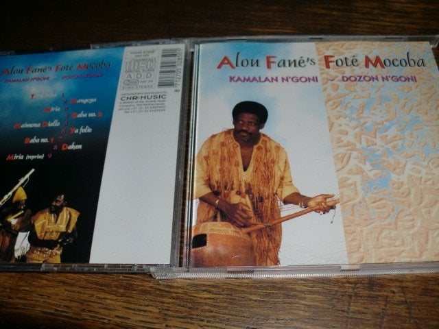Alou Fané's Foté Mocoba ‎– Kamalan/ Dozon N'goni Dakar ‎CD  , Ophalen of Verzenden, Zo goed als nieuw, Overige soorten