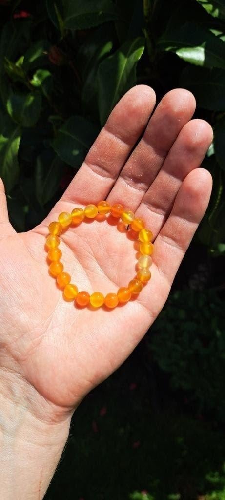 Carneool Armband op Elastiek - Kralen 0,9 cm, Met bedels of kralen, Nieuw, Oranje, Ophalen of Verzenden