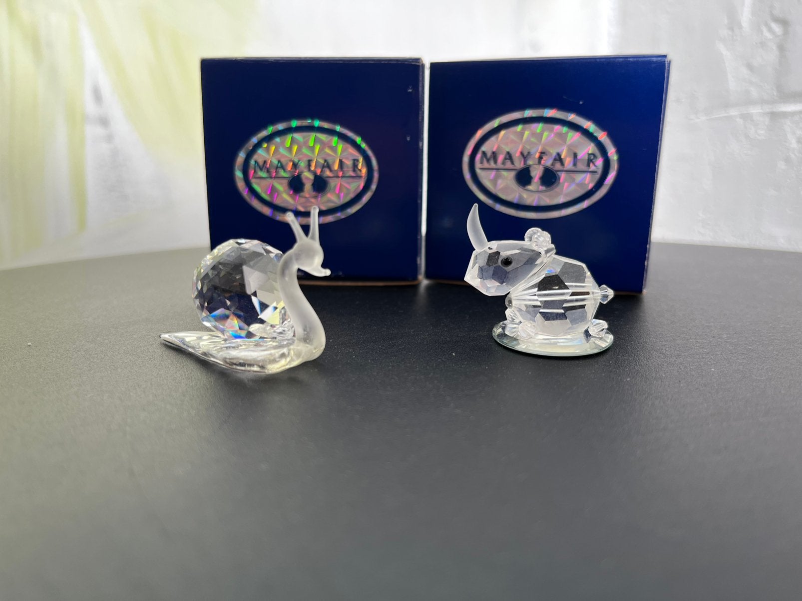Twee kristallen figuren “slak en neushoorn”, Verzamelen, Swarovski, Ophalen of Verzenden, Zo goed als nieuw, Figuurtje