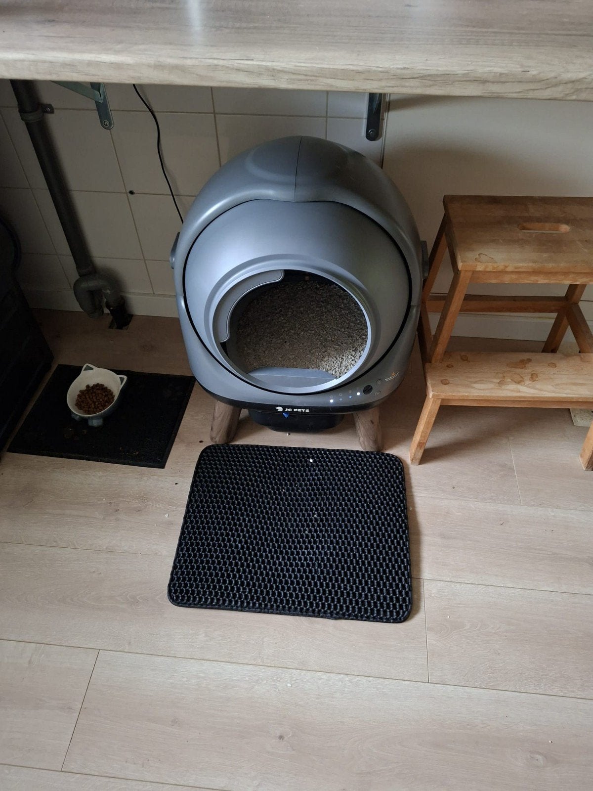Kattenbak, Ophalen