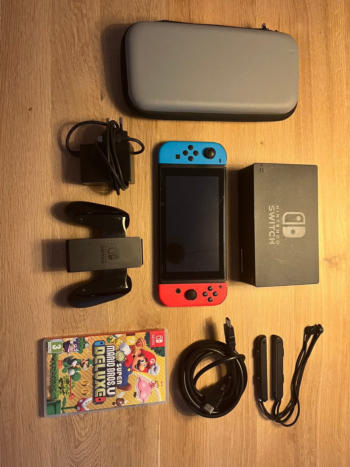Nintendo Switch 1 + Mario Bros. U Deluxe + accessoires, Ophalen, Met games, Met 2 controllers, Zo goed als nieuw