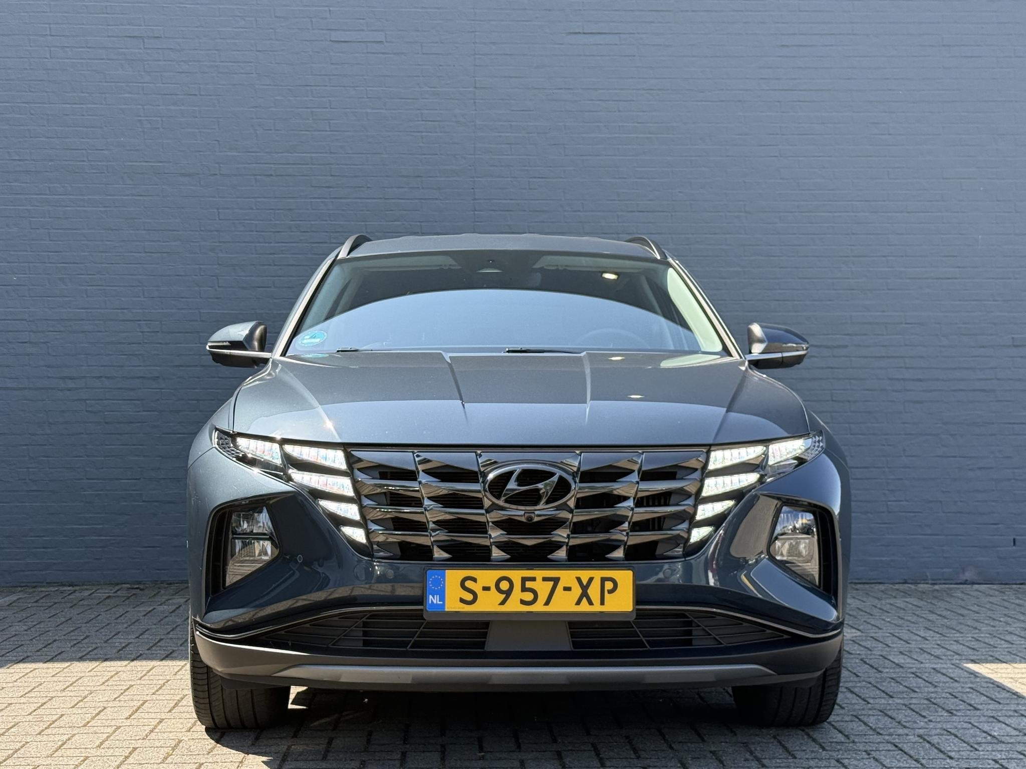 Hyundai Tucson 1.6 T-GDI HEV Premium, Auto's, Euro 6, 4 cilinders, Blauw, 1650 kg