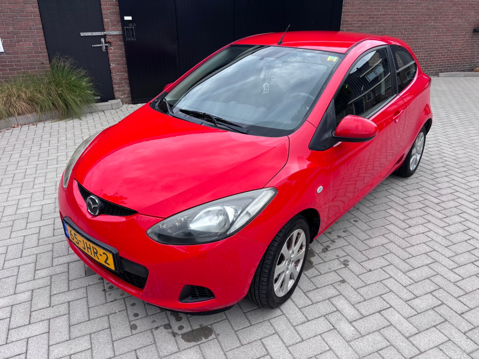 Mazda 2 1.3 55KW 3DRS 2009 Rood, Voorwielaandrijving, Stof, 74 pk, 4 cilinders