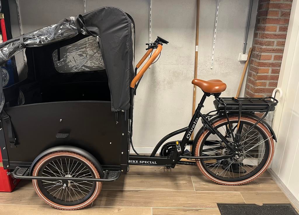 Qivelo Troy elektrische bakfiets, 4 kinderen of meer, Huif, Zo goed als nieuw, Ophalen