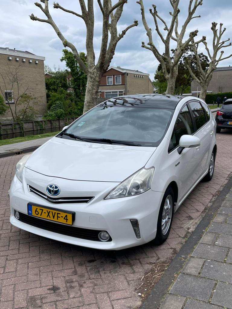 Toyota Prius Wagon 1.8 Full Hybrid 136PK Aut 96g 2012 Wit, Auto's, Toyota, 4 cilinders, Overige bekleding, 7 stoelen, Wit