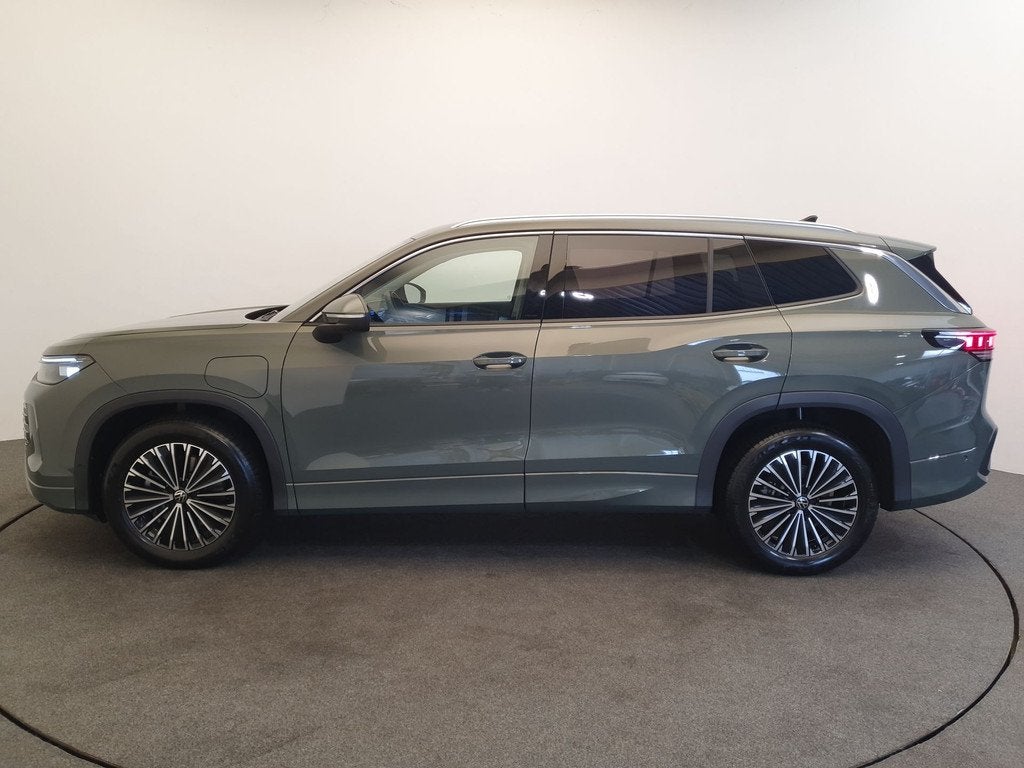 Volkswagen Tayron 1.5 eHybrid DSG/AUT 204pk Elegance Wegklap, Auto's, Volkswagen, 12 maanden, Zwart, 4 cilinders, Leder en Stof