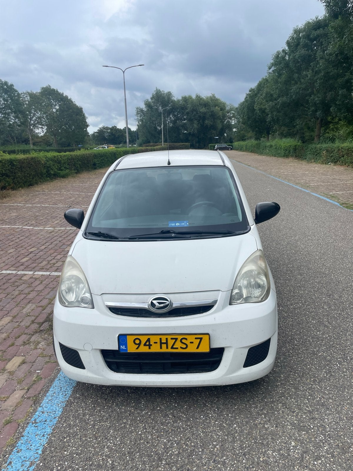 Daihatsu Cuore 1.0 5D 2009 Wit, Auto's, Daihatsu, Voorwielaandrijving, 600 kg, Zwart, 18 €/maand