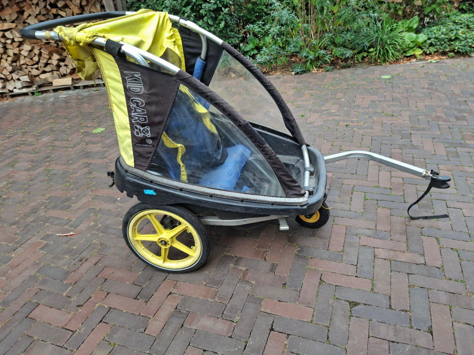Kid Car fietskar/wandelwagen - Geel/Zwart, Ophalen, Gebruikt, Opvouwbaar, 20 tot 40 kg