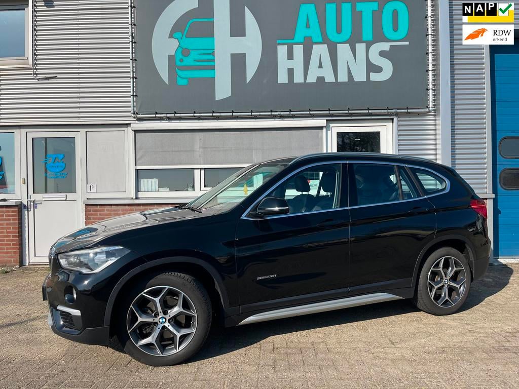 BMW X1 sDrive18i Executive | Exportprijs!, Auto's, BMW, 136 pk, Gebruikt, Leder en Stof, Zwart