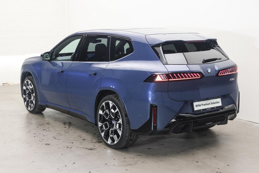 BMW iX3 50 xDrive M Sport / Panoramadak / M Sportstoelen / I, Auto's, BMW, Gebruikt, Zwart, Met garantie (alle), Blauw