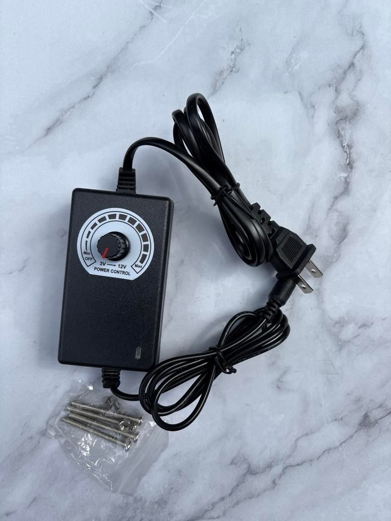 Universele AC Adapter met Instelbare Spanning 3V-12V, Ophalen of Verzenden, Nieuw
