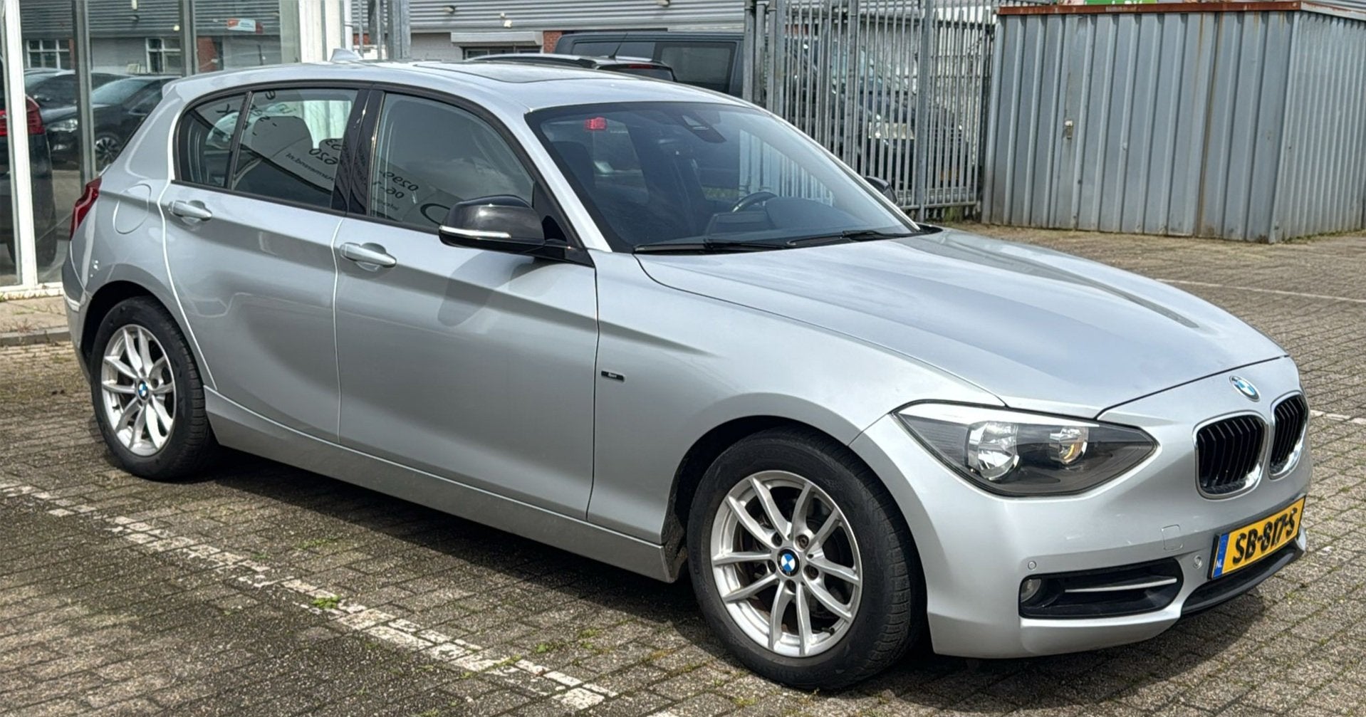 BMW 1-serie 116i Business+ Sport, Auto's, BMW, 1-Serie, Euro 5, Gebruikt, Zwart