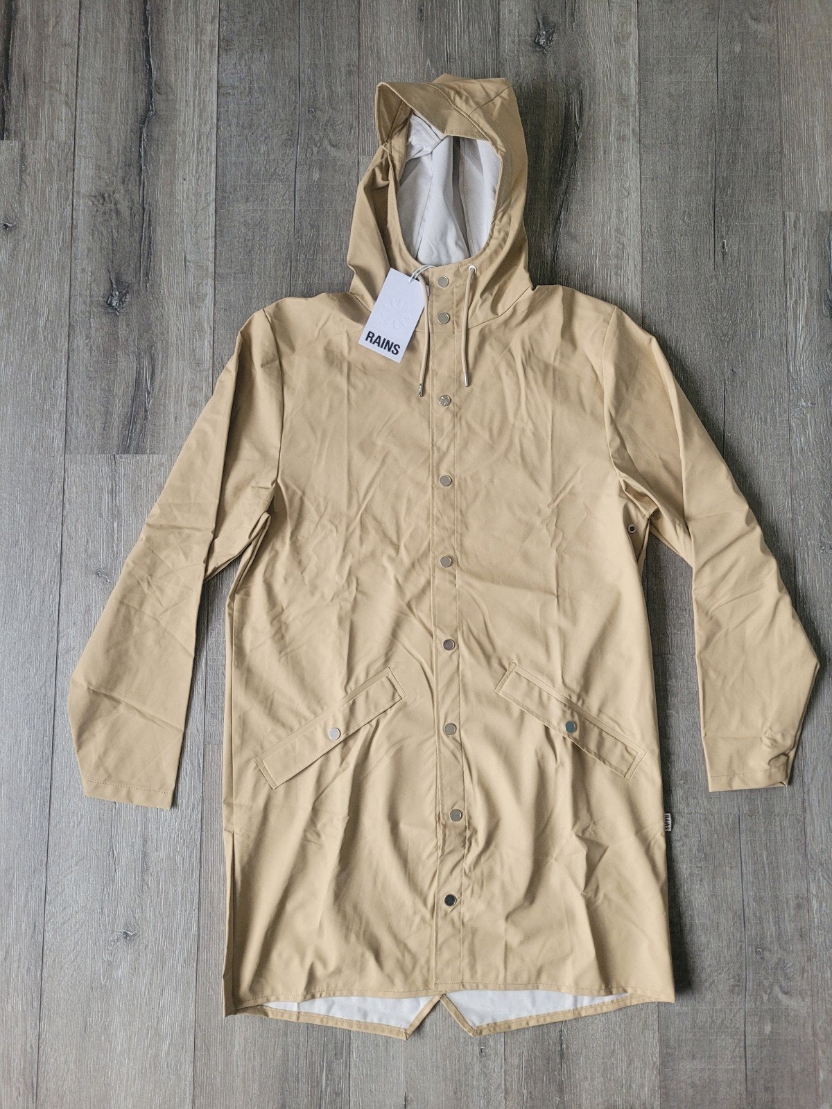 Nieuwe RAINS Long Jacket Sand - Unisex Regenjas Maat M, Caravans en Kamperen, Ophalen of Verzenden, Nieuw, Regenjas, Dames