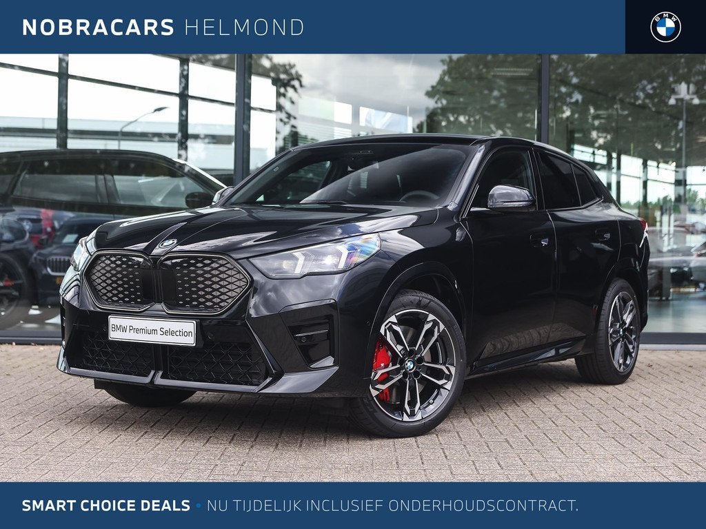 BMW iX2 eDrive20 M Sport / Panoramadak / Trekhaak / Sportsto, Auto's, BMW, IX2, Met garantie (alle), Zwart, Origineel Nederlands