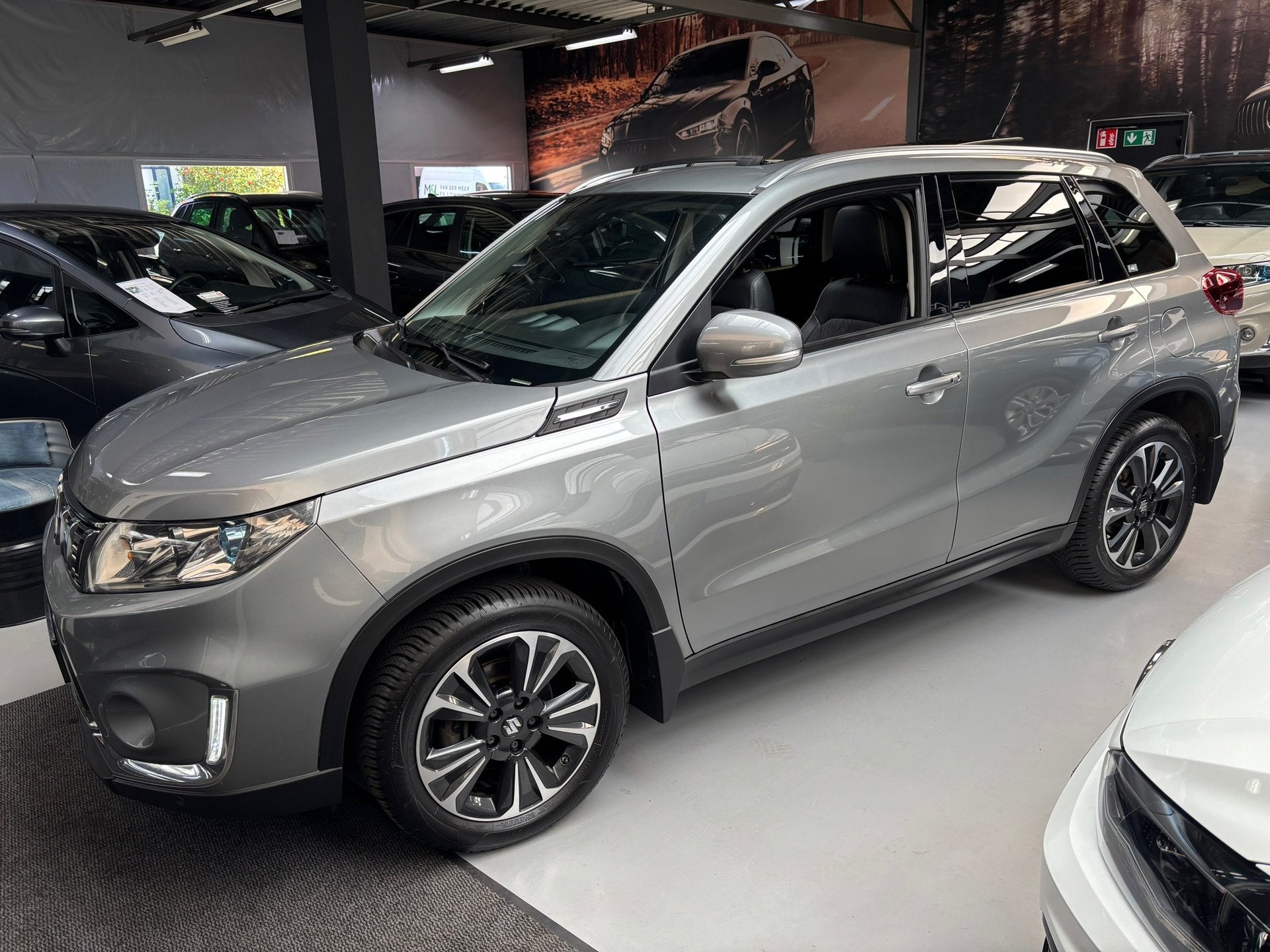 Suzuki VITARA 1.0 Boosterjet Stijl / Camera / Panorama Dak, Auto's, Voorwielaandrijving, Gebruikt, Met garantie (alle), 400 kg