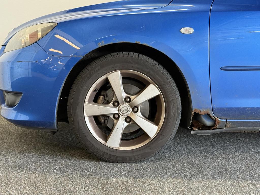 Mazda 3 Sport 1.6 Touring export! (Roest), Auto's, Mazda, Voorwielaandrijving, 1160 kg, Stof, Gebruikt
