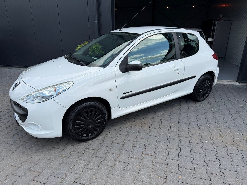 Peugeot 206 + 1.4 Millesim 200, Auto's, Voorwielaandrijving, Stof, 4 cilinders, Wit