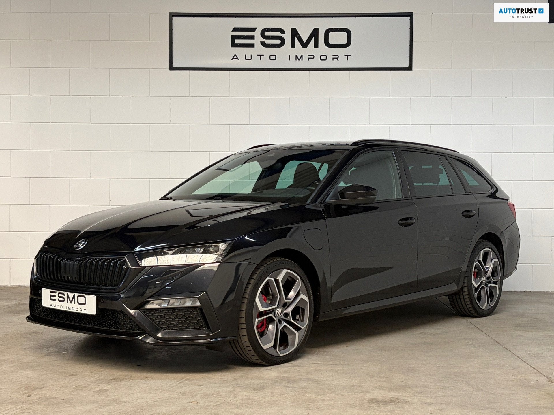 Skoda Octavia Combi 1.4 TSI RS iV PHEV Business, Auto's, Dealer onderhouden, Gebruikt, 4 cilinders, Zwart