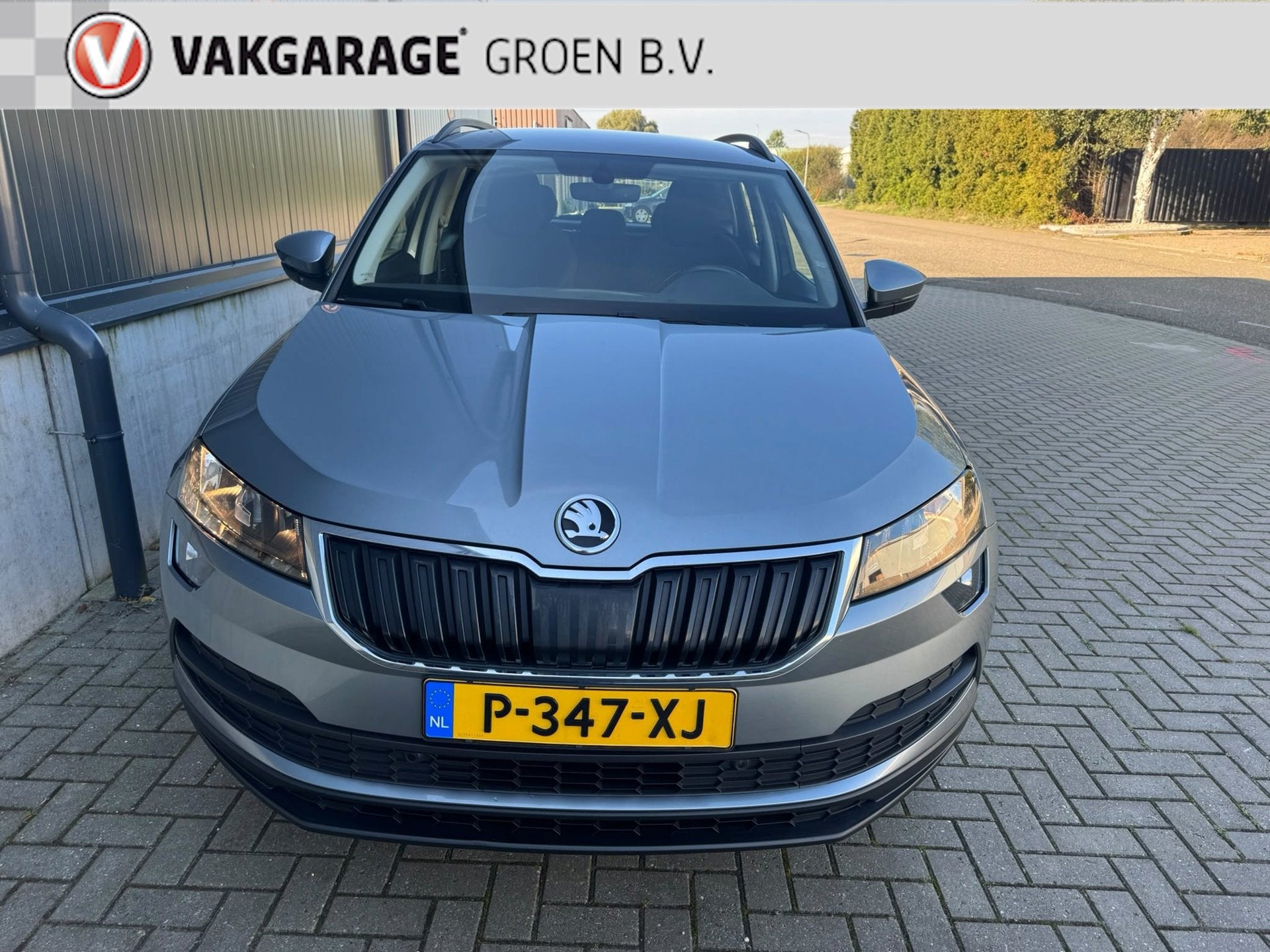 Skoda Karoq 1.0 TSI Style / clima / cruise / navi / camera /, Auto's, Voorwielaandrijving, Stof, Gebruikt, Verwarmde buitenspiegels