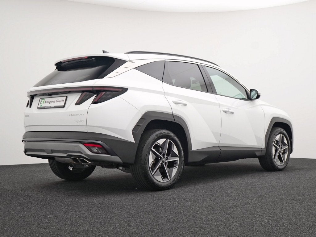 Hyundai Tucson 1.6 T-GDI HEV Comfort | Private lease 679,- p, Auto's, Dealer onderhouden, Stof, Gebruikt, Zwart