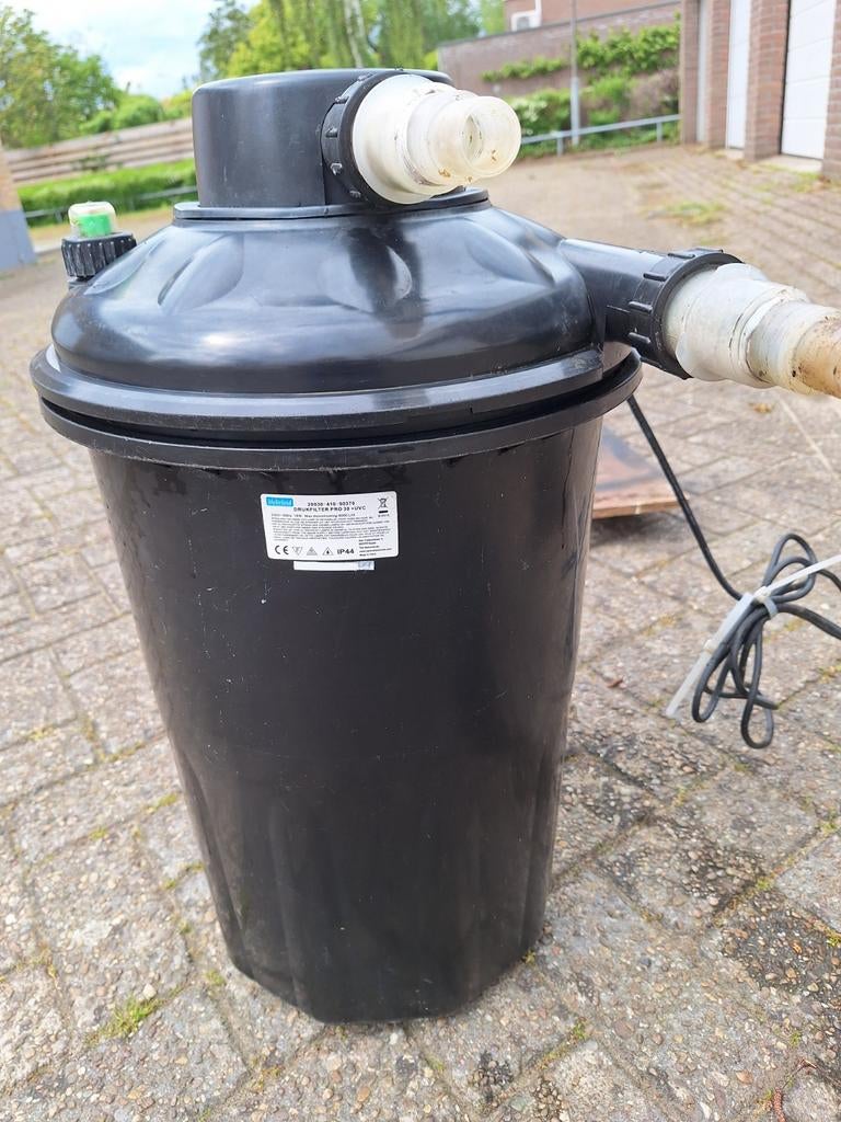 drukvat  voor vijver met toe behoren, Ophalen