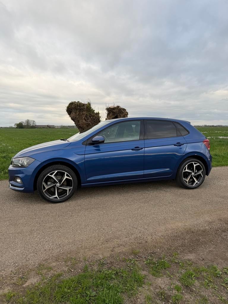 Volkswagen Polo 1.0 TSI 115pk 7-DSG 2018 Blauw, Auto's, Zwart, 49 €/maand, 115 pk, Particulier