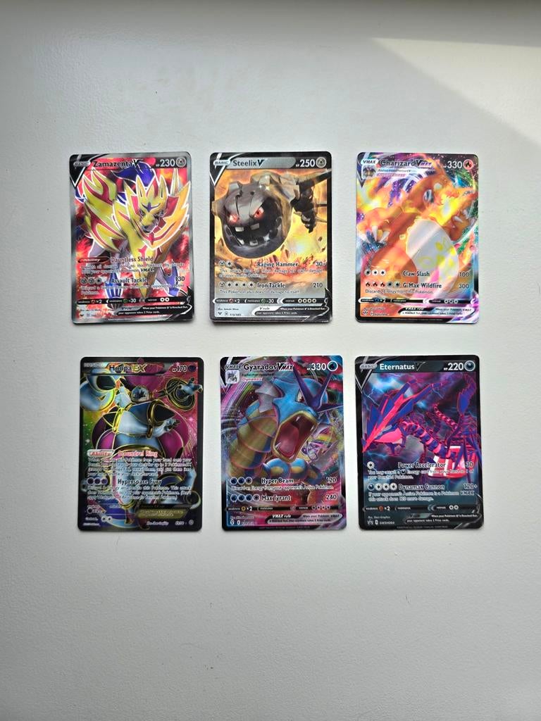 Diverse pokemon kaarten v max charizard gyarados, Ophalen of Verzenden, Zo goed als nieuw, Meerdere kaarten