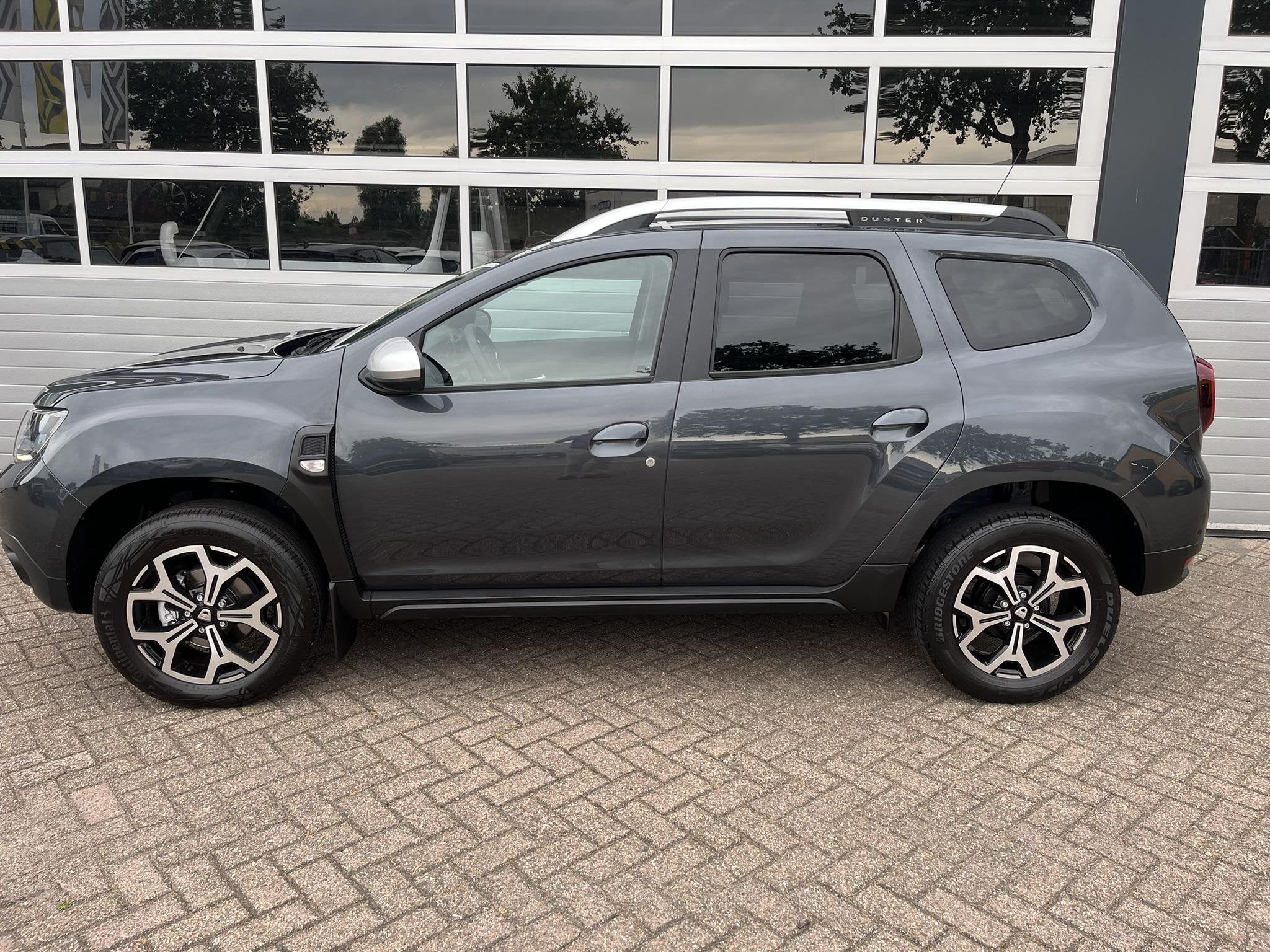 Dacia Duster 1.2 TCe 125 Prestige, Auto's, Dacia, Voorwielaandrijving, 12 maanden, Gebruikt, Euro 6