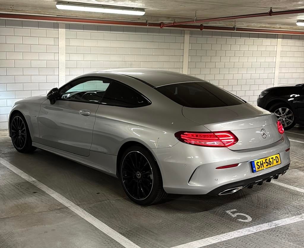 Mercedes C-Klasse Coupé Night Edition AMG | C180 Automaat, Auto's, Automaat, Achterwielaandrijving, 1800 kg, Zwart