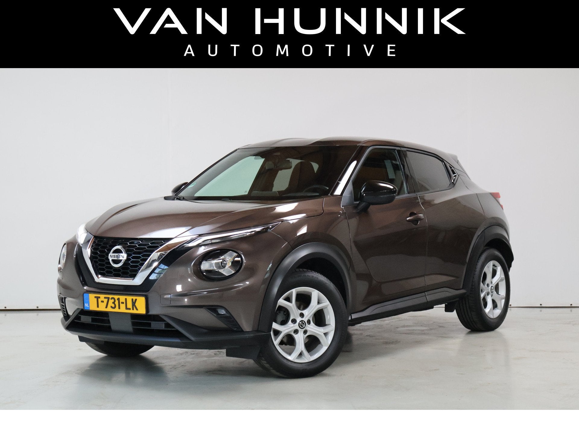 Nissan Juke 1.0 DIG-T Acenta | Dab | Camera | Trekhaak | Sto, Stof, Bruin, 1176 kg, Bedrijf