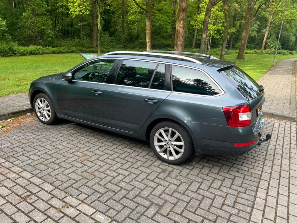 Skoda Octavia 1.2 TSI 77KW Combi 2014 Grijs, Auto's, Skoda, Voorwielaandrijving, Euro 5, 4 cilinders, 620 kg