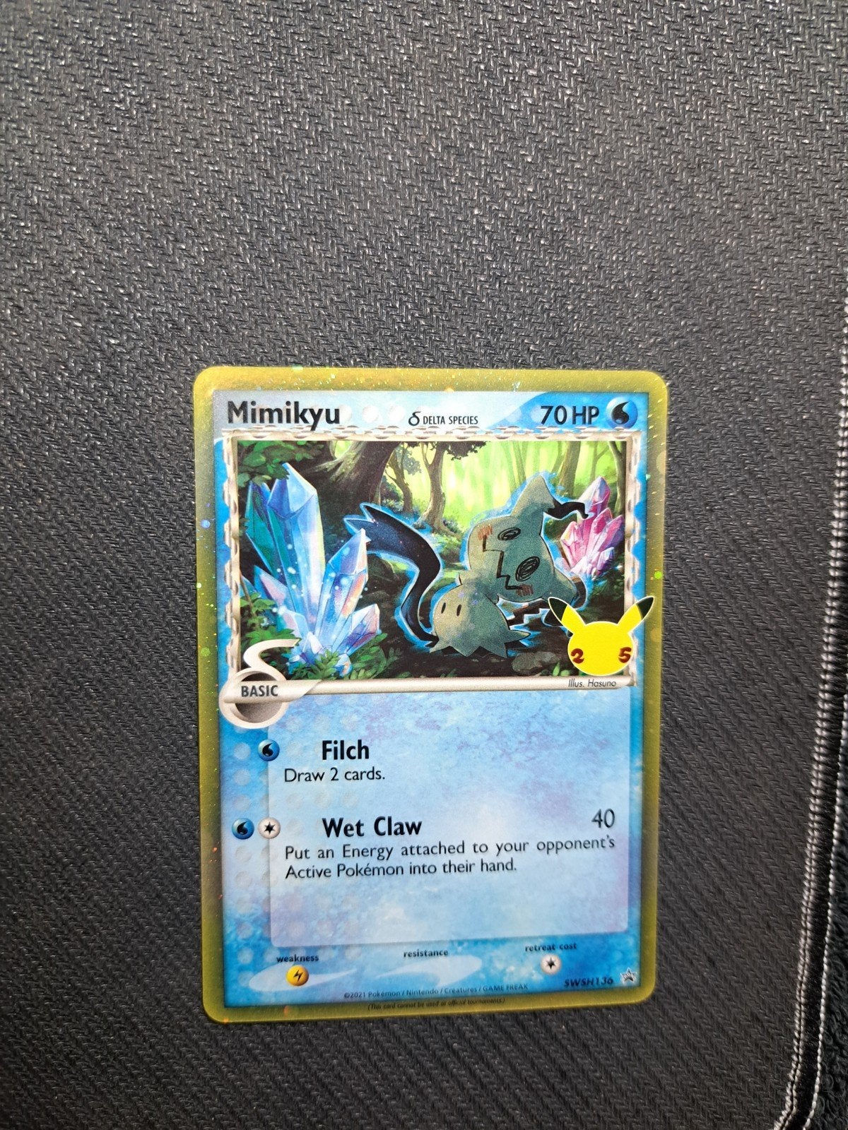 Mimikyu Pokémon promo Kaart - Celebrations 25th Anniversary, Hobby en Vrije tijd, Ophalen of Verzenden, Zo goed als nieuw, Losse kaart