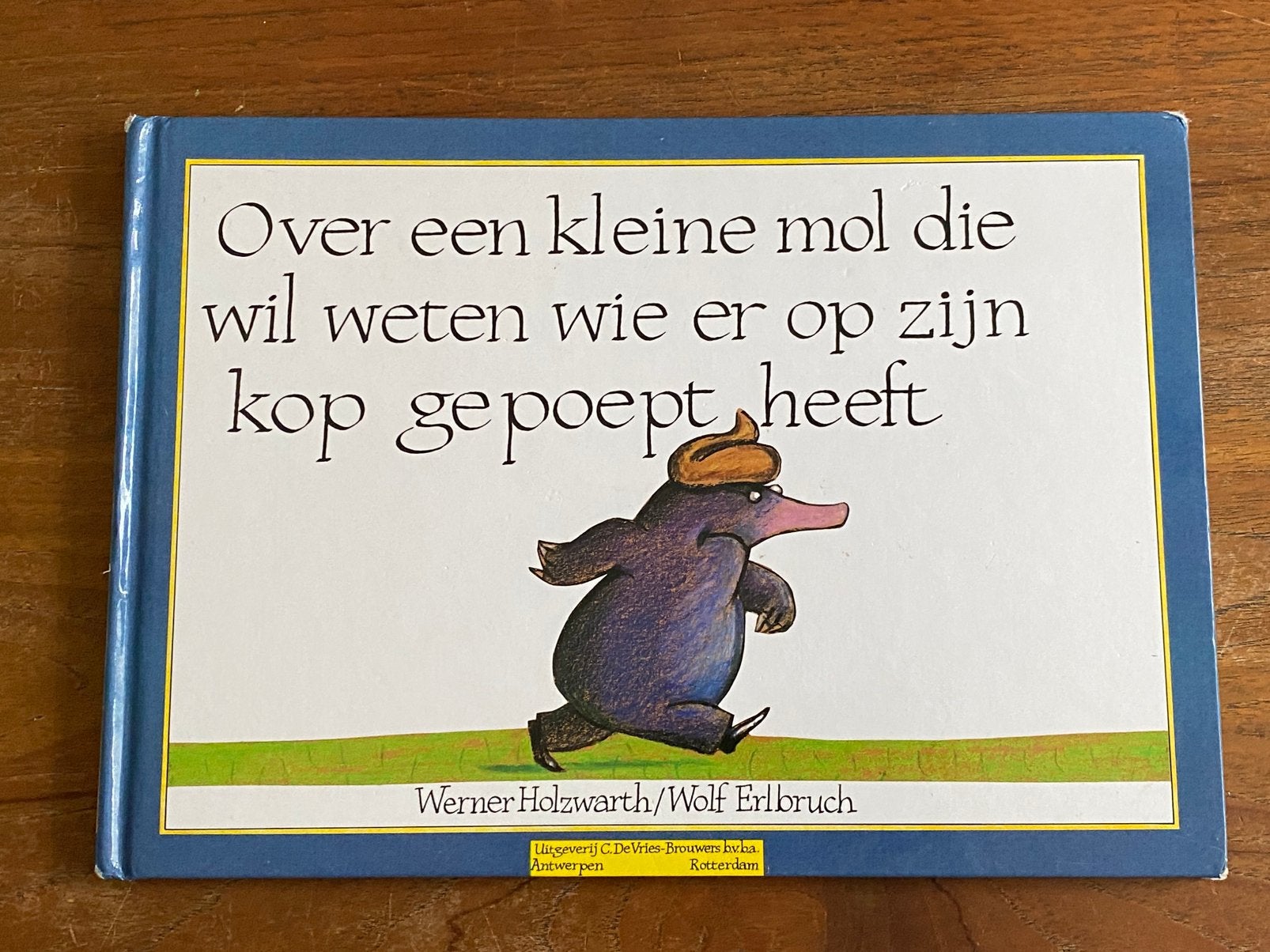 Over een kleine mol die wil weten wie er op zijn kop gepoept, Boeken, Ophalen of Verzenden, Gelezen, Prentenboek