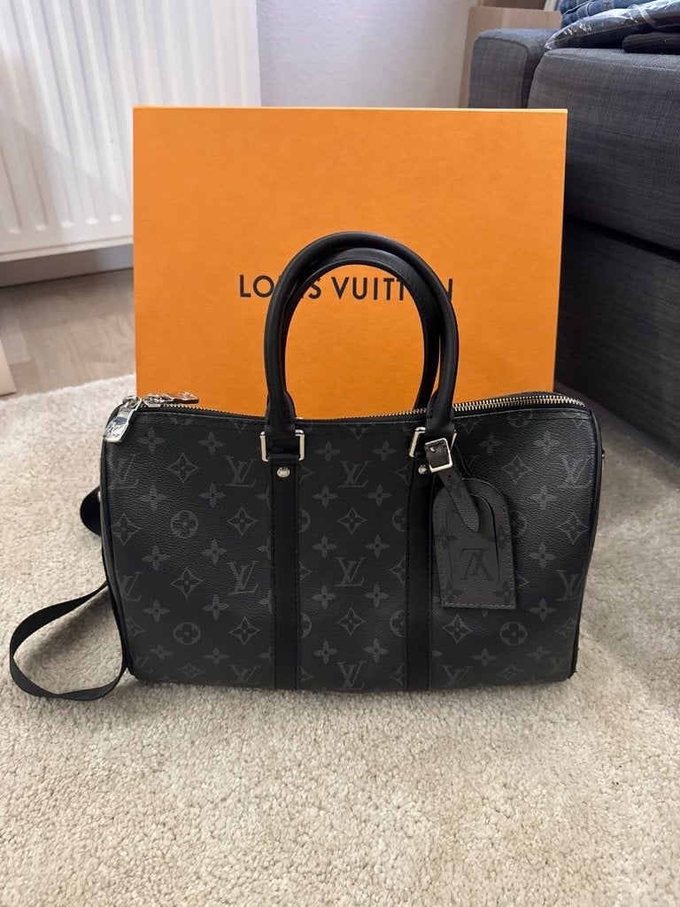 Louis Vuitton Keepall bandouliére 35, Sieraden, Tassen en Uiterlijk, 40 tot 60 cm, Zwart, Minder dan 35 cm, Zo goed als nieuw