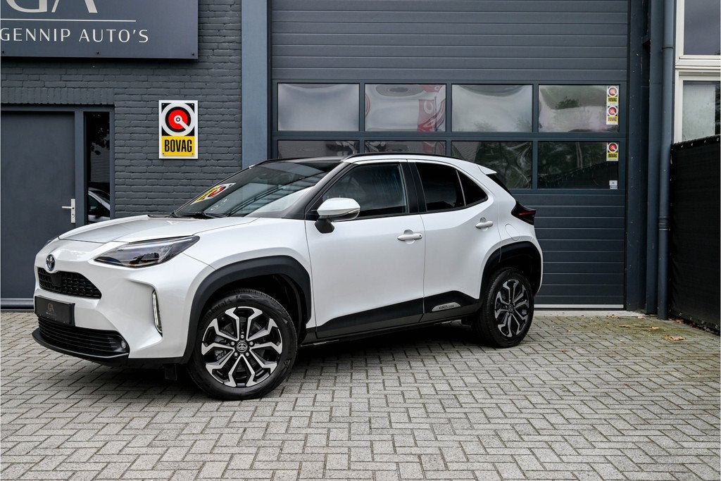 Toyota Yaris Cross 1.5 Hybrid Dynamic, PANO, Head Up, Stoel, Stof, Gebruikt, 116 pk, Wit