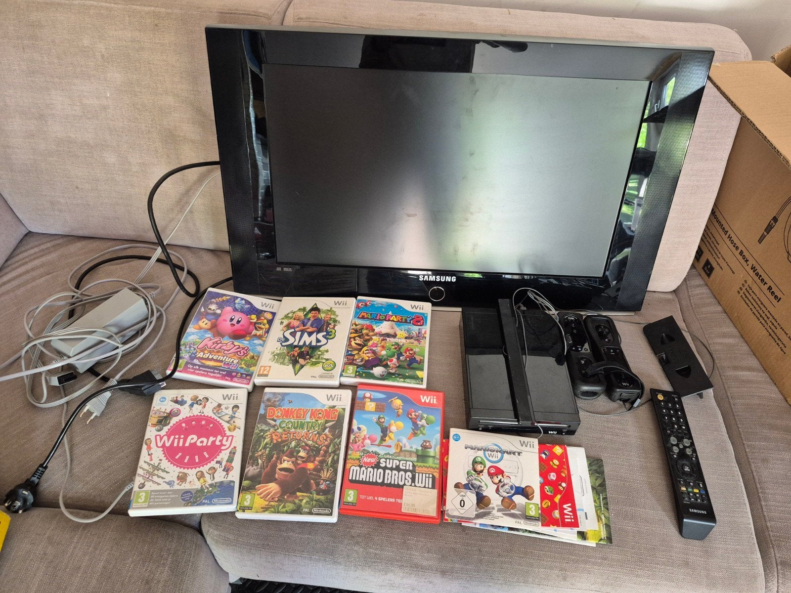 Wii console met spellen en Samsung TV, Ophalen
