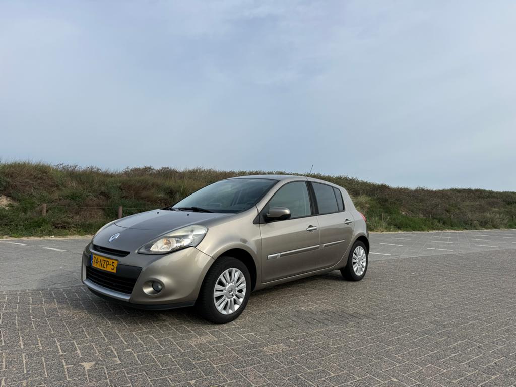 Renault Clio 1.2 16V 55KW 5-DRS E4 2011 Beige, Auto's, Voorwielaandrijving, Stof, 74 pk, Zwart