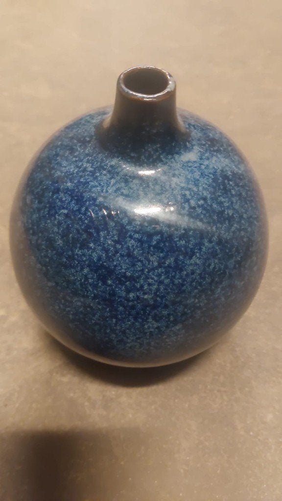 blauwe vaas, Ophalen