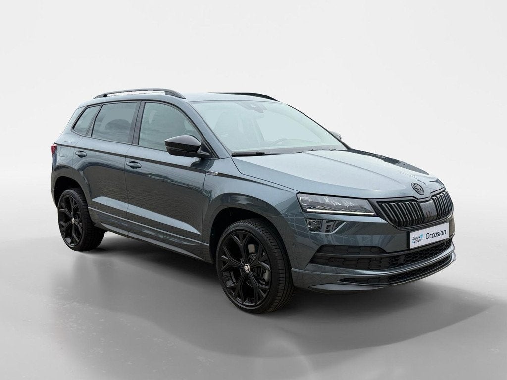Skoda Karoq 1.5 TSI ACT Sportline Business |Functie pakket|, Auto's, Skoda, 12 maanden, Stof, 4 cilinders, Karoq